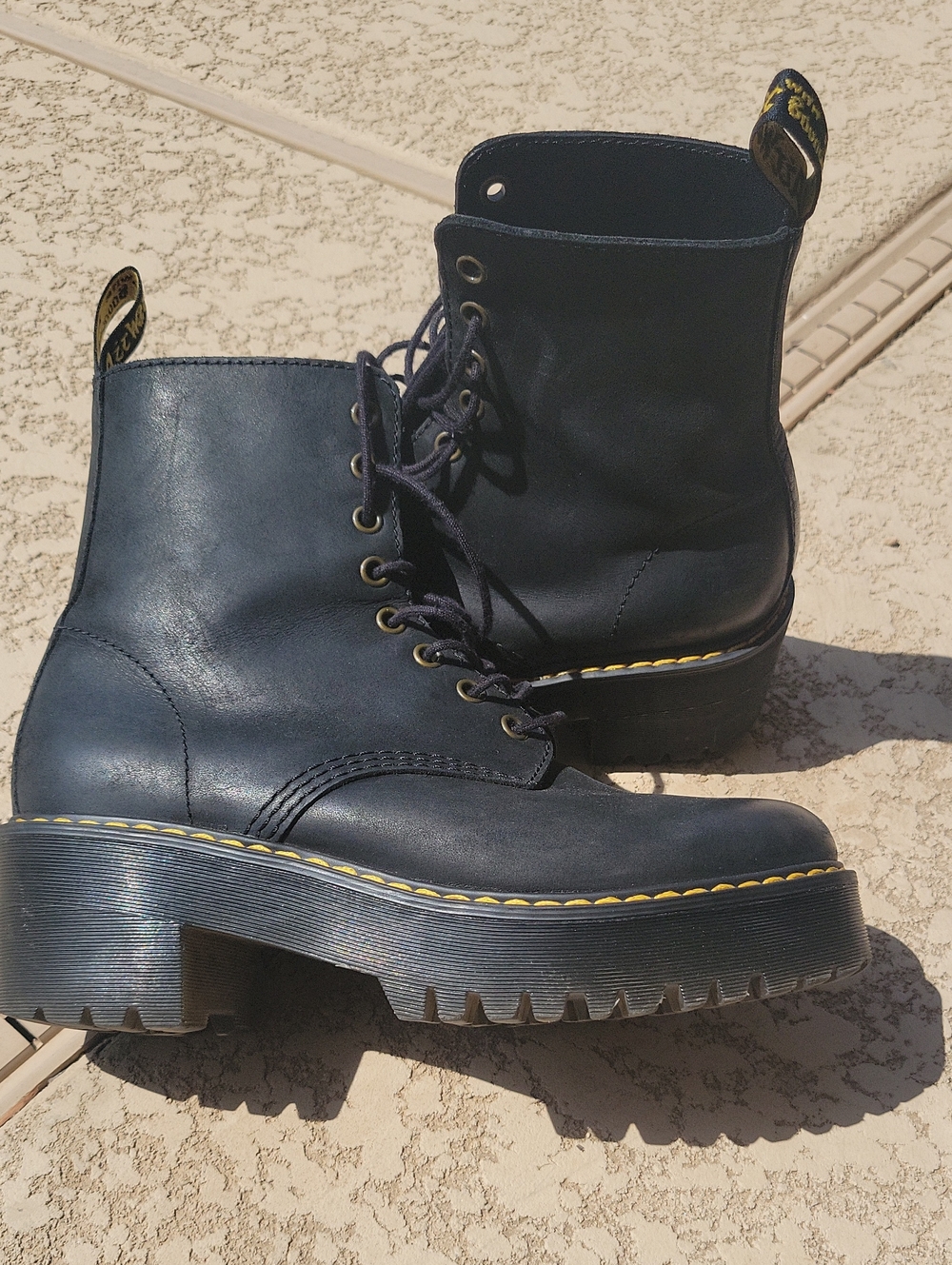 Dr. Martens Black Leather Platform Lace-Up Boots with Yellow Stitching
